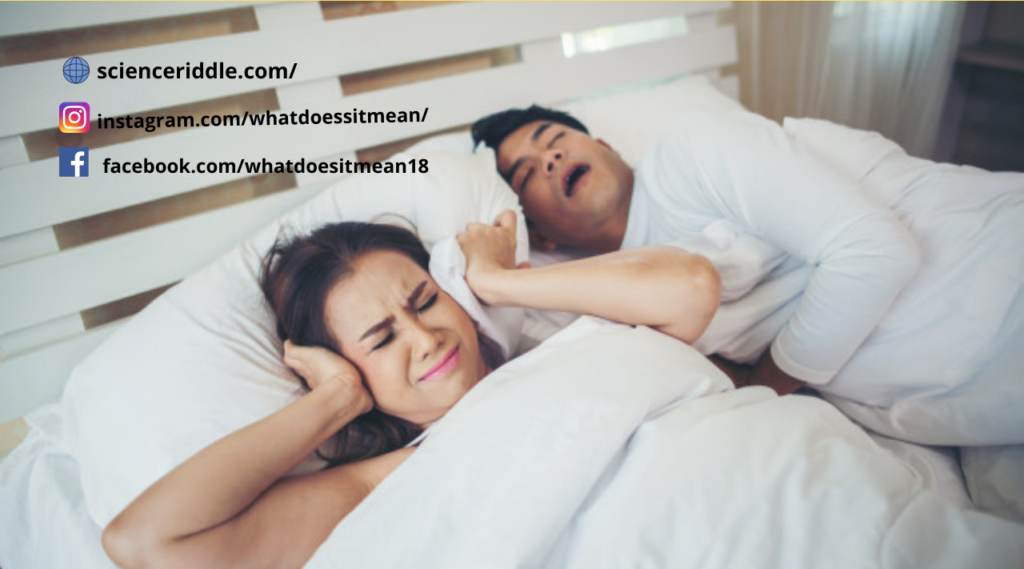 Why does a person snore ?